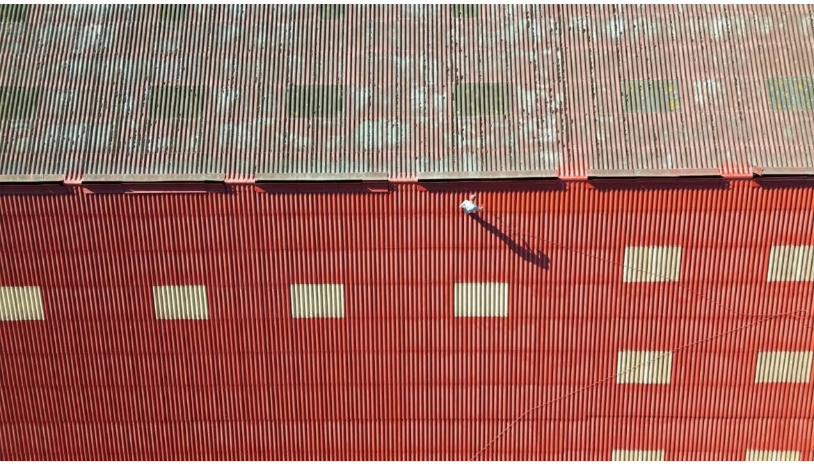 Peinture de toiture de hangar réalisée par Artisan MG